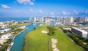 clun-puerto-cancun-golf-compressed